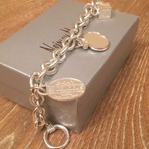 DKNY • SILVER •CHARM BRACELET.